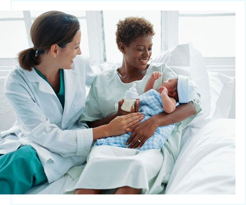 A woman and two women holding a baby.