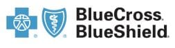 A blue cross and blue shield logo.